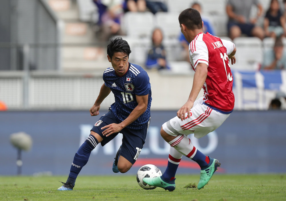 Japanu00e2u20acu2122s Shinji Kagawa in action with Paraguayu00e2u20acu2122s Junior Alonso during the international friendly in Tivoli-Neu, Innsbruck June 12, 2018. u00e2u20acu201d Reuters pic