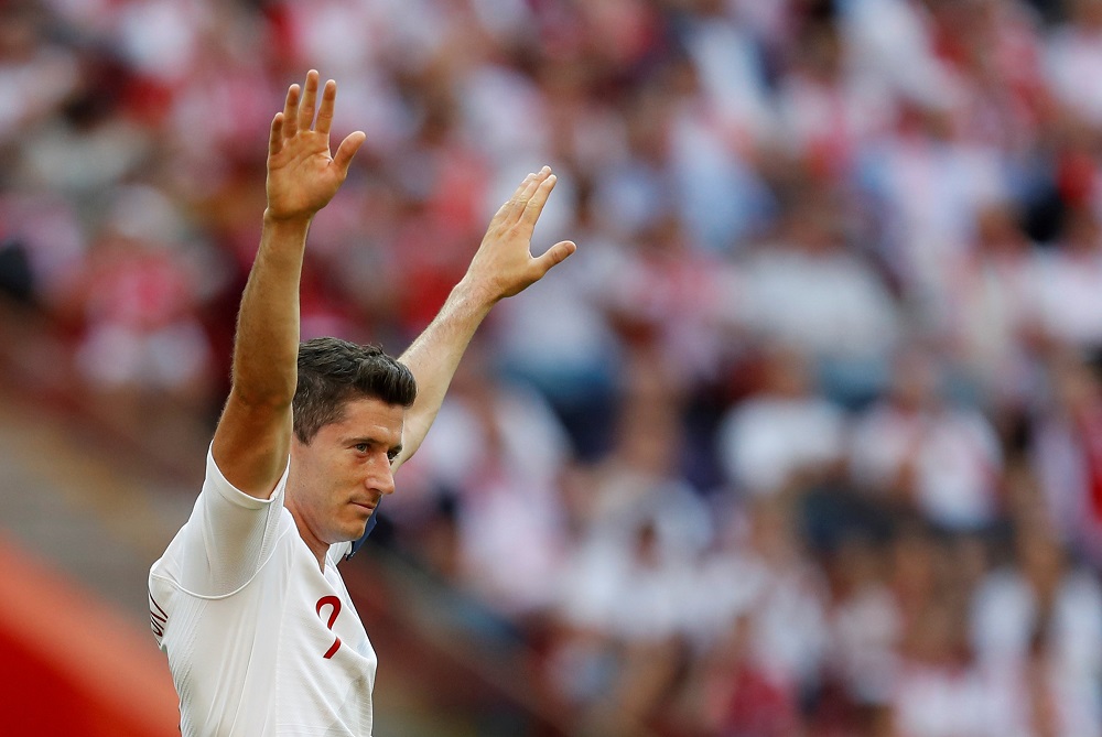Poland's Robert Lewandowski celebrates scoring their second goal against Lithuania in Warsaw June 12, 2018. u00e2u20acu201d Reuters pic 