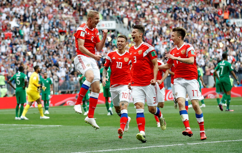 Russia's Yury Gazinsky celebrates scoring their first goal against Saudi Arabia with team mates in Moscow June 14, 2018. u00e2u20acu201d Reuters pic 