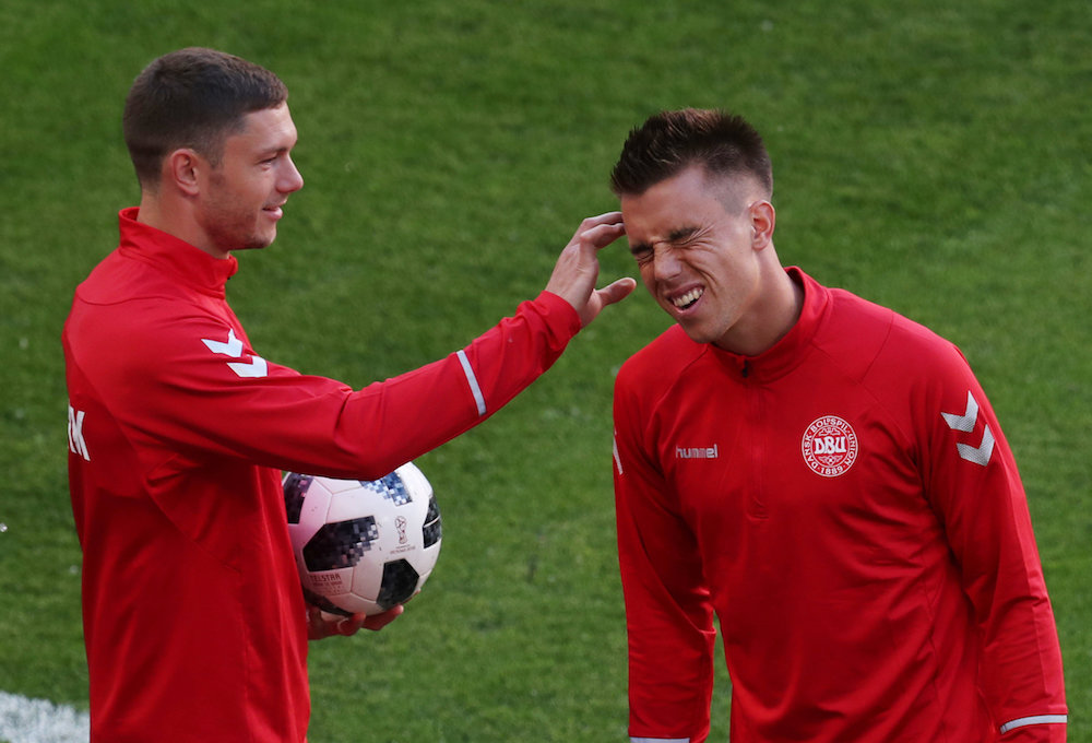 Denmarku00e2u20acu2122s Jonas Knudsen and Henrik Dalsgaard fool around during training in Saransk June 15, 2018. u00e2u20acu201d Reuters pic