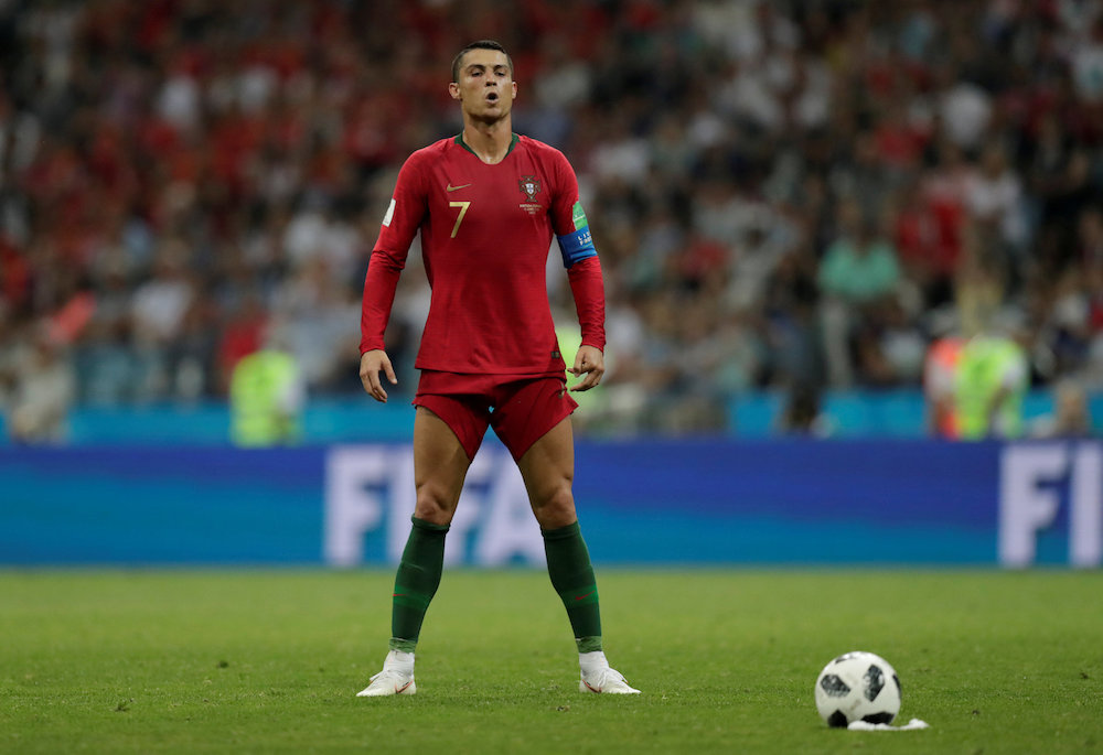 Portugalu00e2u20acu2122s Cristiano Ronaldo lines up before scoring their third goal from a free kick during the Group B match against Spain at the 2018 Fifa World Cup in Sochi June 15, 2018. u00e2u20acu201d Reuters pic