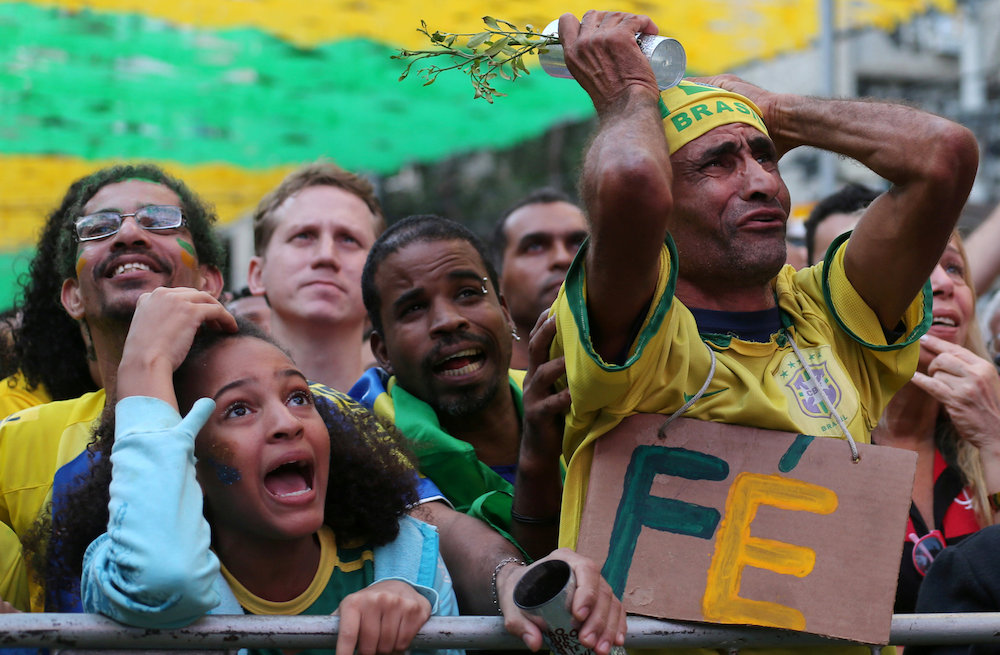 Fans react as they watch the broadcast of the Fifa World Cup Group E match between Brazil and Switzerland, in Rio de Janeiro June 17, 2018. u00e2u20acu201d Reuters pic