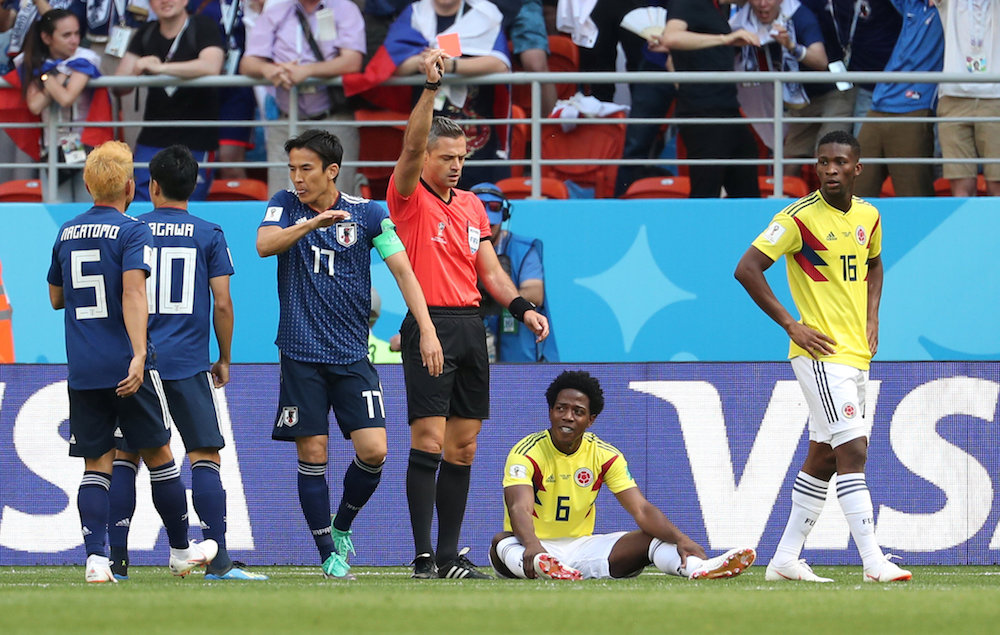 Colombiau00e2u20acu2122s Carlos Sanchez is shown a red card by referee Damir Skomina during the Group H match against Japan at the 2018 Fifa World Cup in Saransk June 19, 2018. u00e2u20acu201d Reuters pic