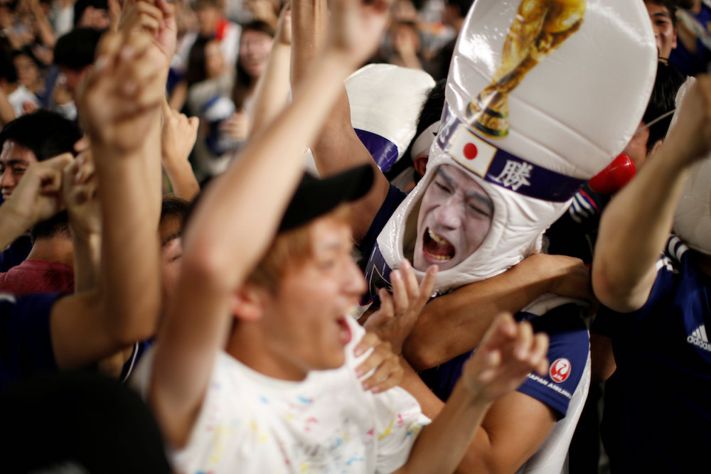 Fans react after Japanu00e2u20acu2122s second goal as they watch a broadcast of the World Cup Group H match Colombia vs Japan, at a public viewing event at Tokyo Dome in Tokyo June 19, 2018. u00e2u20acu201d Reuters pic
