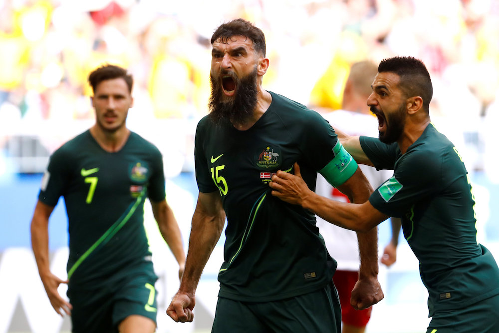 Australiau00e2u20acu2122s Mile Jedinak celebrates scoring their first goal with team mates against Denmark at the 2018 Fifa World Cup in Samara June 21, 2018. u00e2u20acu201d Reuters pic