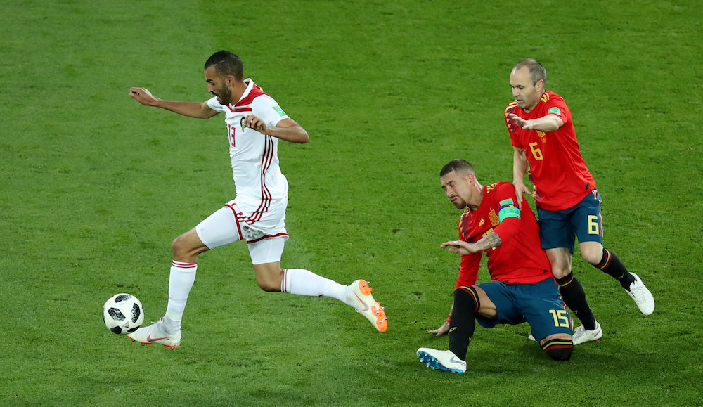 Moroccou00e2u20acu2122s Khalid Boutaib gets away from Spainu00e2u20acu2122s Sergio Ramos and Andres Iniesta on his way to scoring their first goal at the 2018 Fifa World Cup in Kaliningrad June 25, 2018. u00e2u20acu201d Reuters pic