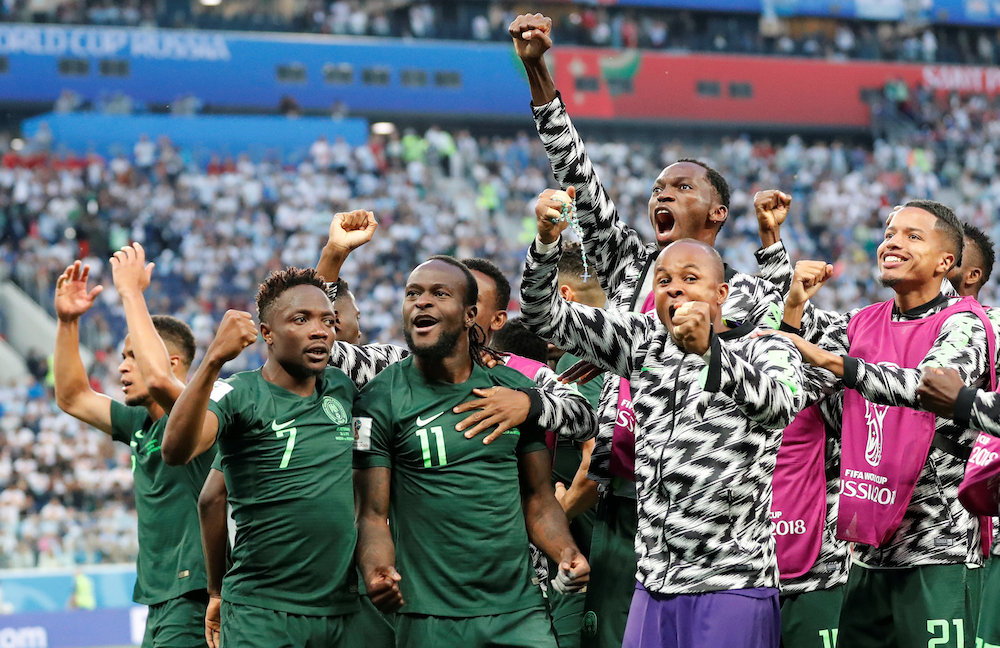 Nigeriau00e2u20acu2122s Victor Moses celebrates scoring their first goal against Argentina, with Ahmed Musa and team mates, at the 2018 Fifa World Cup in St Petersburg June 26, 2018. u00e2u20acu201d Reuters pic