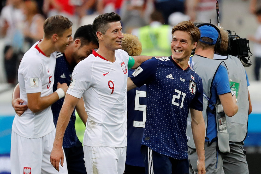 Polandu00e2u20acu2122s Robert Lewandowski shakes hands with Japanu00e2u20acu2122s Gotoku Sakai at the end of the 2018 Fifa World Cup match in Volgograd June 28, 2018. u00e2u20acu201d Reuters pic