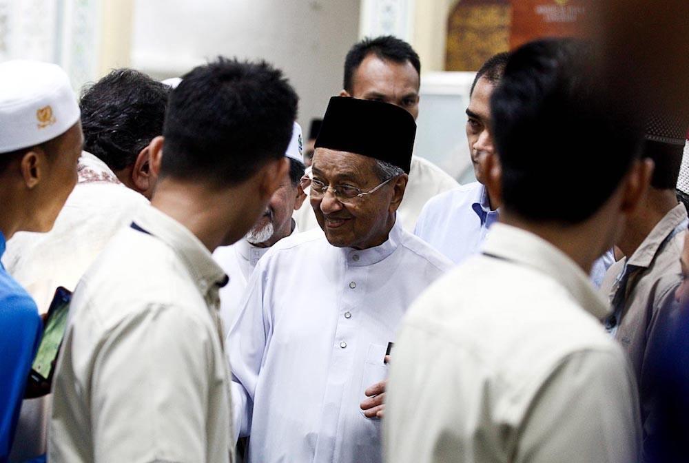 Prime Minister Tun Dr Mahathir Mohamad meets guests at a breaking fast gathering at Al-Hana Mosque in Kuah June 1, 2018. u00e2u20acu201d Picture by Sayuti Zainudin