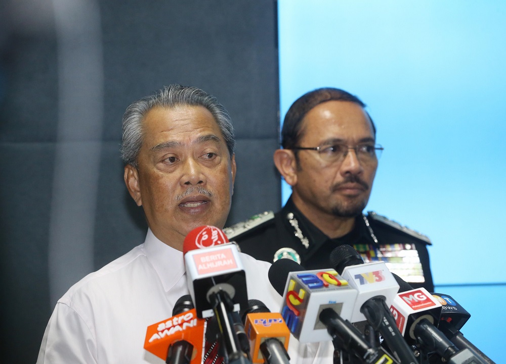 Tan Sri Muhyiddin Yassin speaks during a press conference at the Immigration Department in Putrajaya June 5, 2018. u00e2u20acu2022 Picture by Zuraneeza Zulkifli