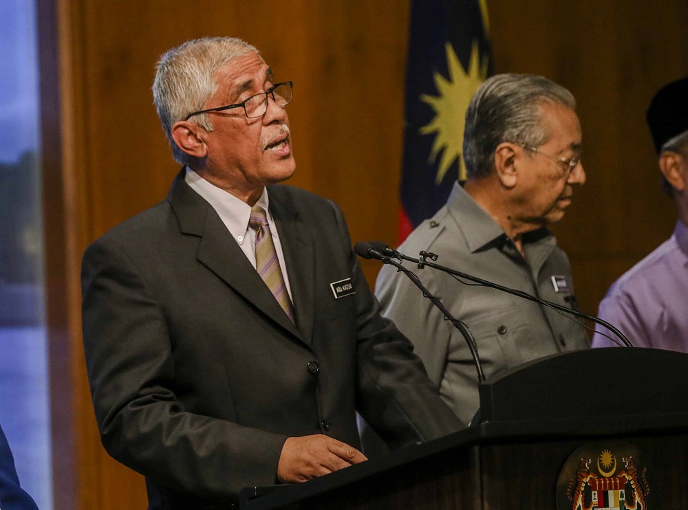 Tan Sri Abu Kassim Mohamed speaks during a press conference at the Perdana Putra Complex in Putrajaya June 8, 2018. u00e2u20acu201d Picture by Firdaus Latif