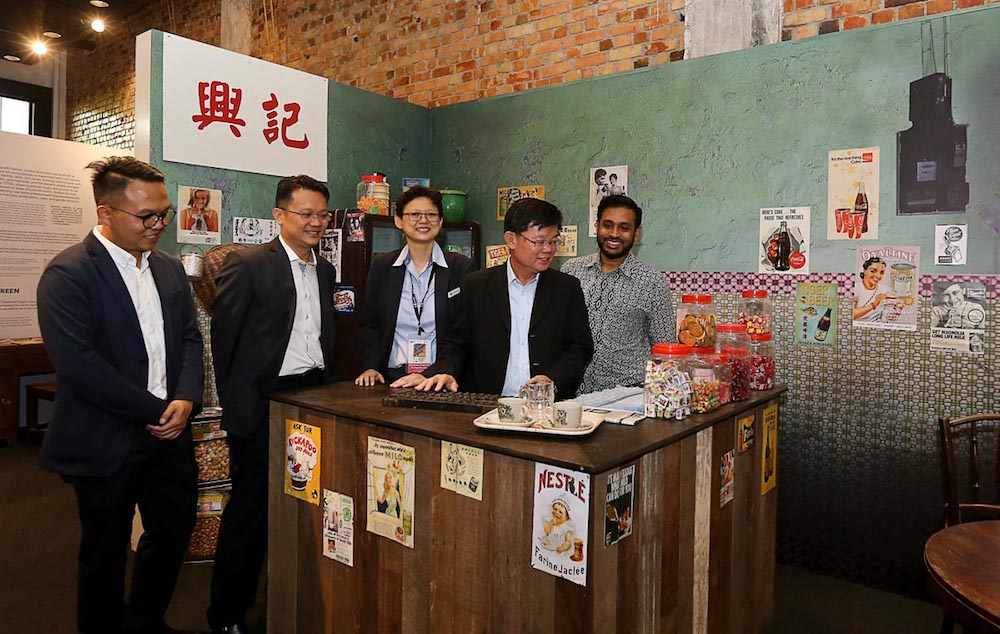 Penang Chief Minister Chow Kon Yeow looks at an installation during the launch of the George Town Unesco World Heritage Site 10th anniversary exhibition in George Town June 14, 2018. u00e2u20acu201d Picture by Sayuti Zainudin