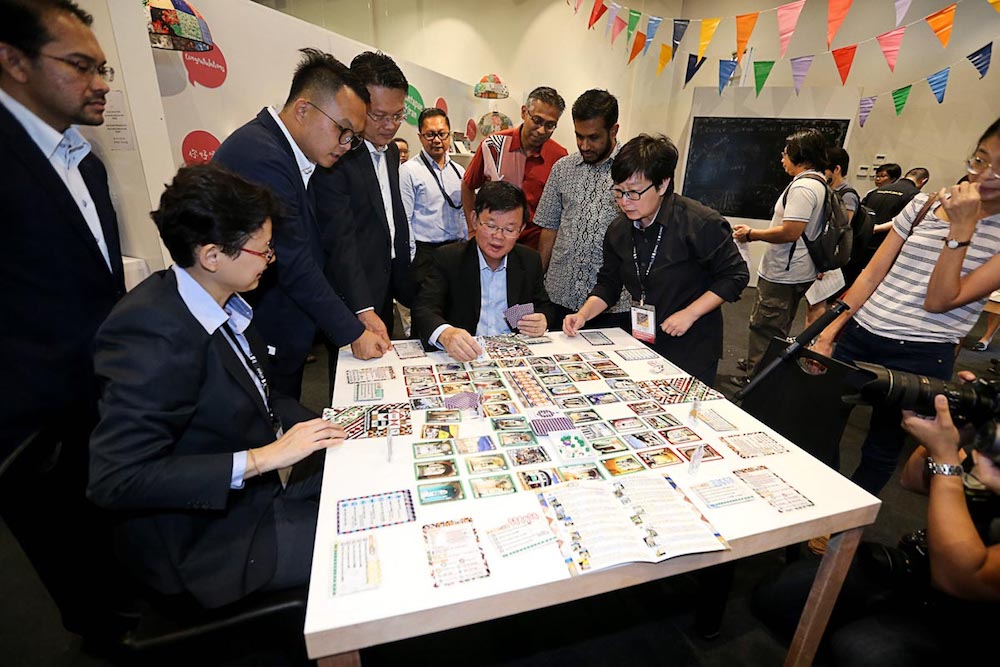 Penang Chief Minister Chow Kon Yeow looks at an installation during the launch of the George Town Unesco World Heritage Site 10th anniversary exhibition in George Town June 14, 2018. — Picture by Sayuti Zainudin