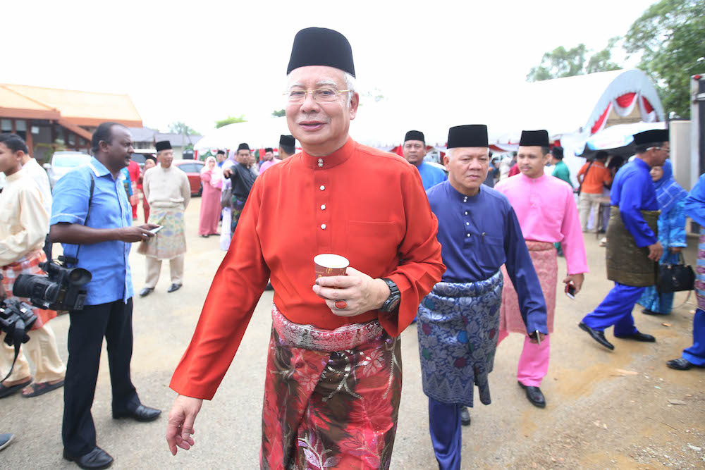 Datuk Seri Najib Razak greets people at his Aidilfitri open house in Pekan June 15, 2018. u00e2u20acu201d Picture by Azinuddin Ghazali