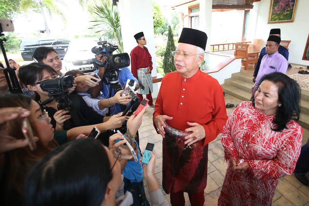 Datuk Seri Najib Razak speaks to reporters at his Aidilfitri open house in Pekan June 15, 2018. u00e2u20acu201d Picture by Azinuddin Ghazali