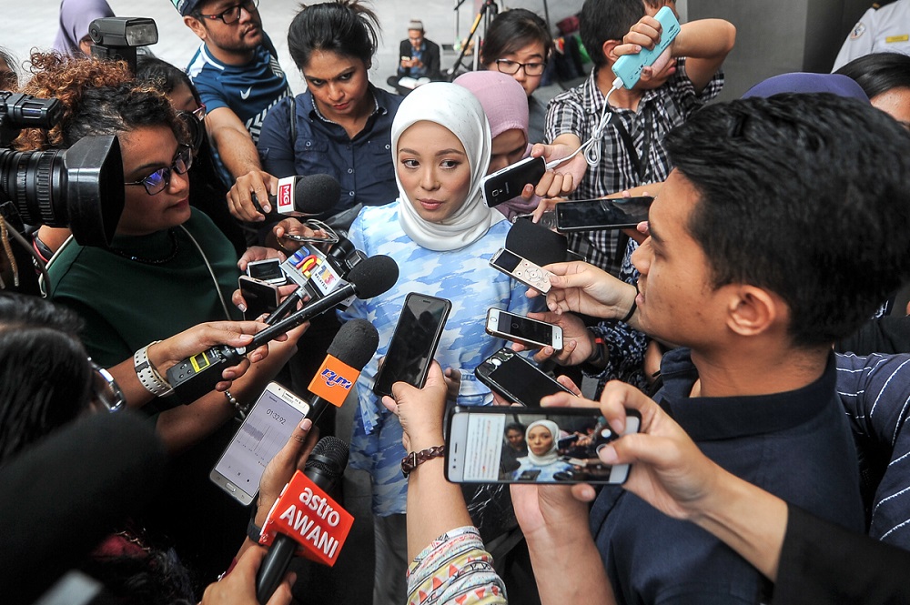 Founder of Fashion Valet Sdn Bhd and dUCK group, Datin Vivy Sofinas Yusof, speaks to reporters at Ilham Tower in Kuala Lumpur June 18, 2018. u00e2u20acu201d Picture by Shafwan Zaidon