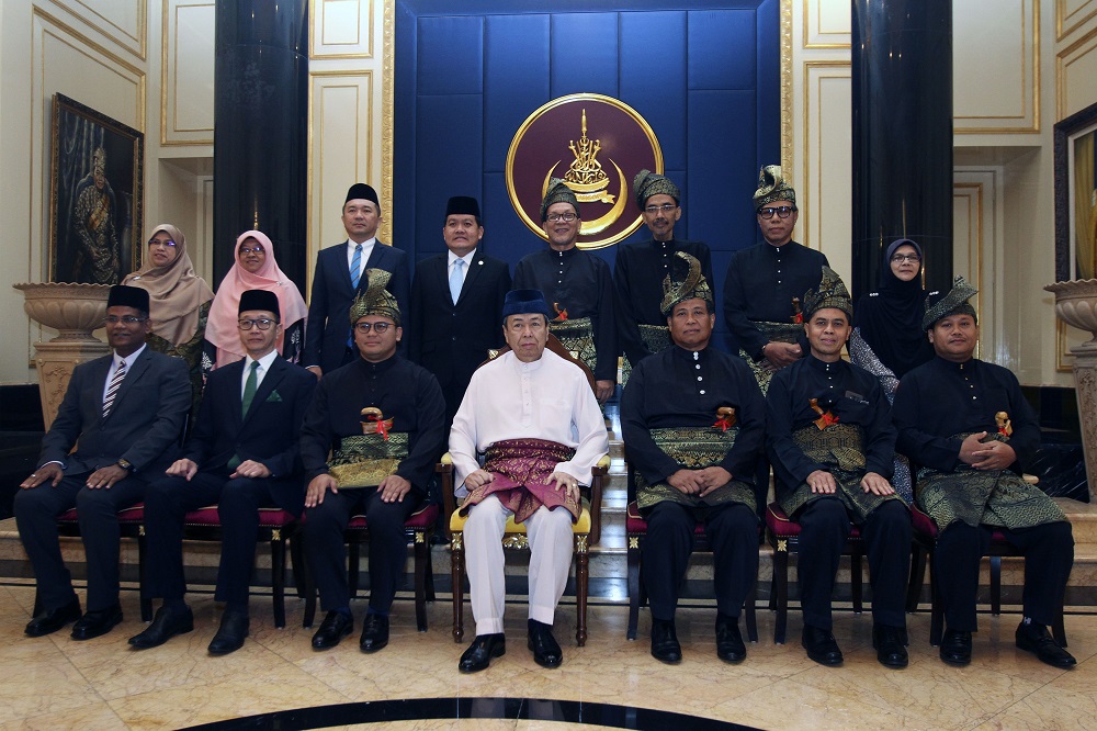Sultan of Selangor Sultan Sharafuddin Idris Shah (centre) with Selangor Mentri Besar Amirudin Shari (third left) and the state exco line-up pose for a group photo at the Alam Shah Palace in Klang June 19, 2018.
