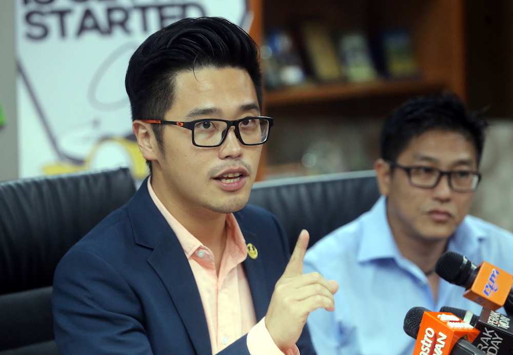 State youth, sports and human capital development committee chairman, Howard Lee Chuan How, announces the new target today. u00e2u20acu201d Picture by Farhan Najib