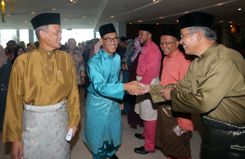 Perak Mentri Besar Ahmad Faizal Azumu greets guests at Perak Water Boardu00e2u20acu2122s Hari Raya open house in Ipoh June 28, 2018. u00e2u20acu201d Picture by Farhan Najib