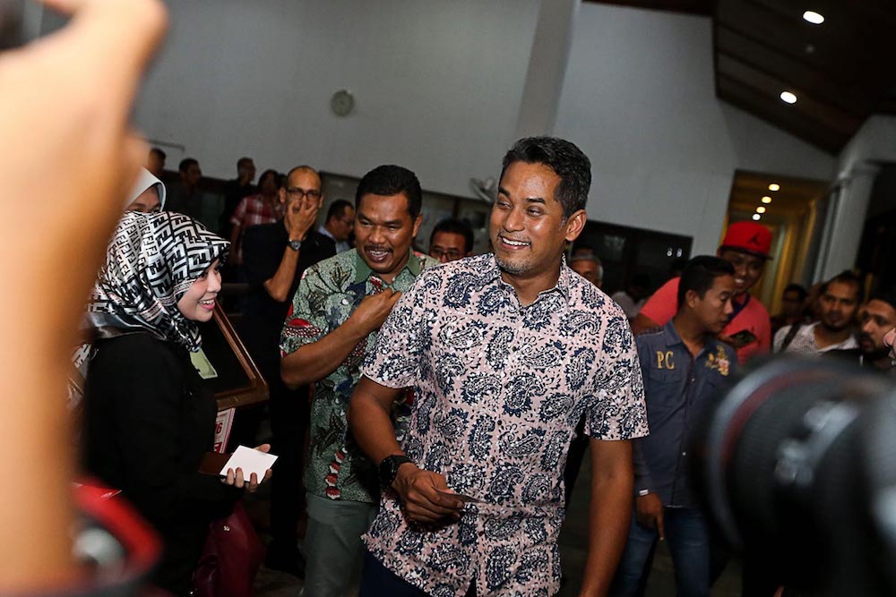Khairy Jamaluddin is greeted by supporters as he arrives for an event in Safira Country Club, Bandar Seberang Jaya June 28, 2018. u00e2u20acu201d Picture by Sayuti Zainudin