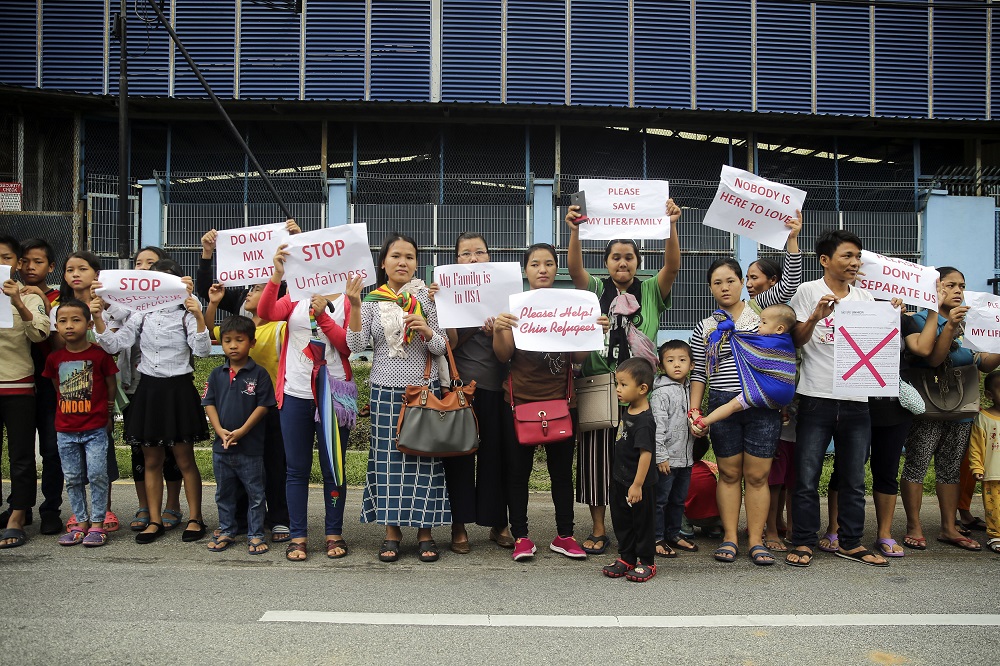 Chin refugees take part in a protest outside the UNHCR building in Kuala Lumpur June 29, 2018. u00e2u20acu201d Picture by Yusof Mat Isa