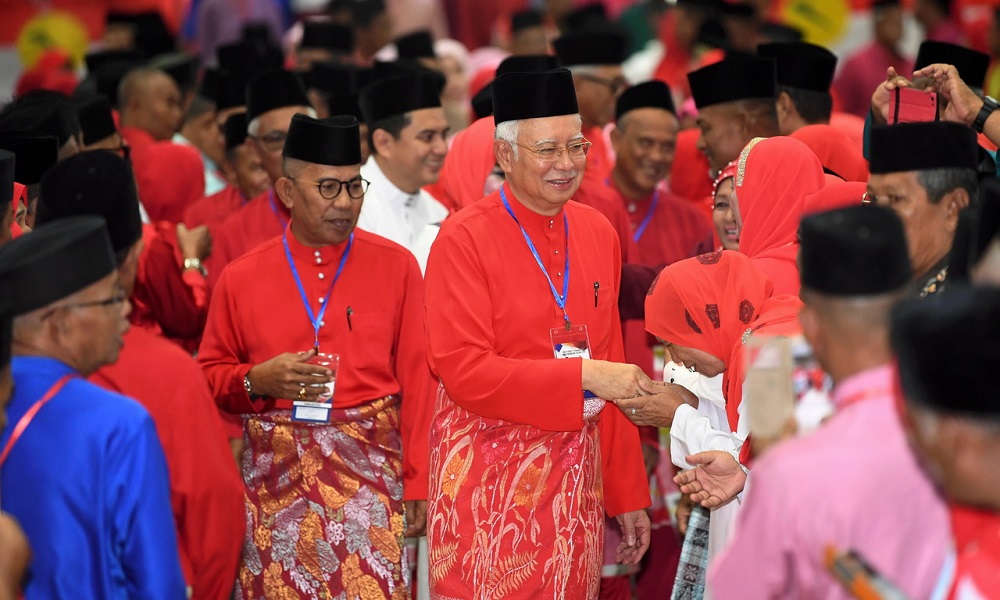 Former Umno president Datuk Seri Najib Razak is greeted by party members at the partyu00e2u20acu2122s delegates meeting in Pekan June 30, 2018. u00e2u20acu201d Bernama pic