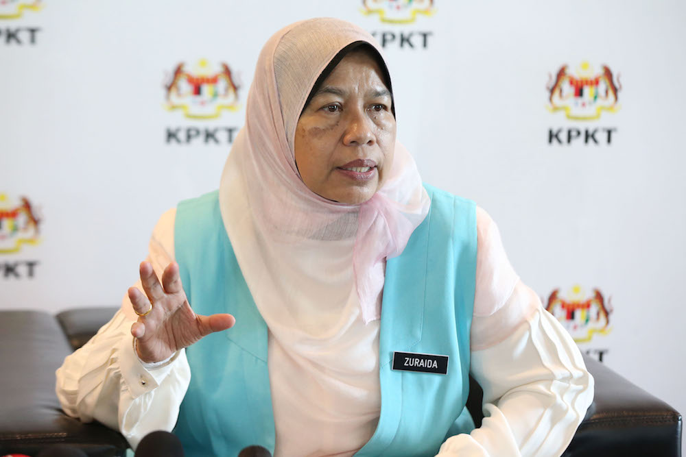 Minister of Housing and Local Government Zuraida Kamaruddin gives a press conference at the KPKT building in Putrajaya June 26, 2018. u00e2u20acu201d Picture by Azinuddin Ghazali