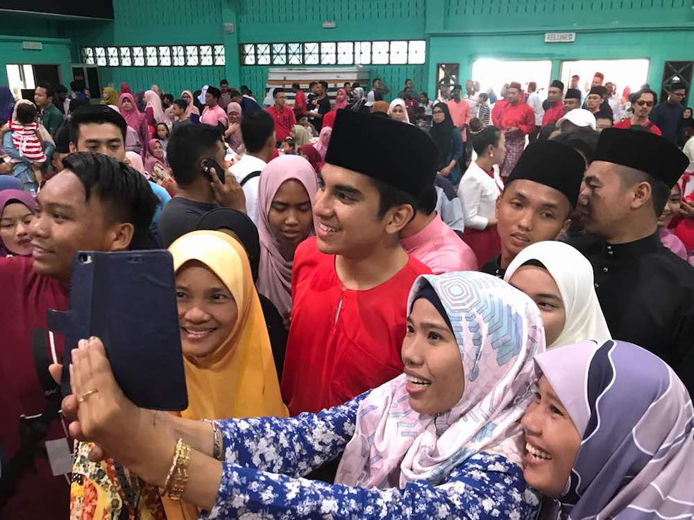 PPBM Youth chief and Muar MP Syed Saddiq Syed Abdul Rahman with visitors keen to take selfies with him at Home Minister Tan Sri Muhyiddin Yassinu00e2u20acu2122s Pagoh parliamentary Aidilfitri open house today. u00e2u20acu201d Picture by Ben Tan
