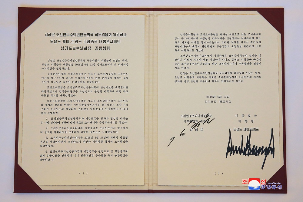 A document signed by US President Donald Trump and North Korea's leader Kim Jong-un is seen in Singapore in this picture released on June 12, 2018. u00e2u20acu201d Reuters pic 