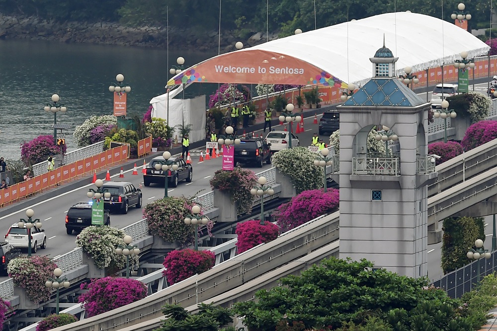 The motorcade transporting US President Donald Trump sets off for Sentosa, the resort island where Trump is scheduled to meet with North Korea's leader Kim Jong-un for a US-North Korea summit, in Singapore on June 12, 2018. u00e2u20acu201d AFP pic