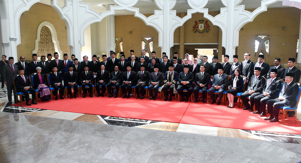 Johor Mentri Besar Datuk Osman Sapian takes a photo with the 50 state assemblymen, who were sworn in, at the Sultan Ismail Building, in Kota Iskandar June 28, 2018. u00e2u20acu201d Bernama pic