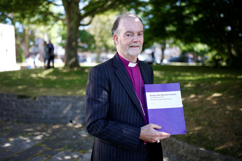Bishop James Jones holds a copy of the 'Gosport War memorial Hospital: The Report of the Gosport Independent Panel', outside Portsmouth Cathedral in Portsmouth, Britain, June 20, 2018. u00e2u20acu201d Reuters pic