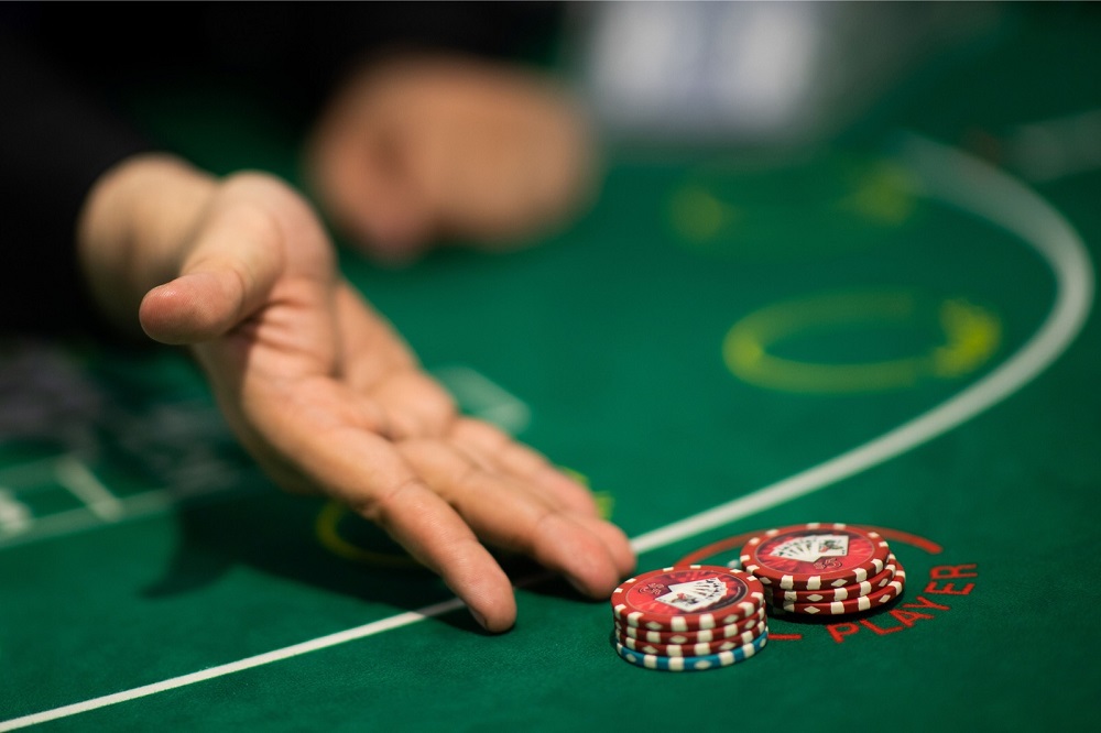 This picture shows a student practising baccarat at the Japan Casino School in Tokyo June 6, 2018. u00e2u20acu201d AFP pic