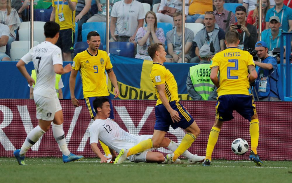 South Koreau00e2u20acu2122s Kim Min-woo fouls Swedenu00e2u20acu2122s Viktor Claesson in the penalty area during their World Cup Group F match in Nizhny Novgorod Stadium, Nizhny Novgorod, Russia, June 18, 2018. u00e2u20acu201d Reuters pic