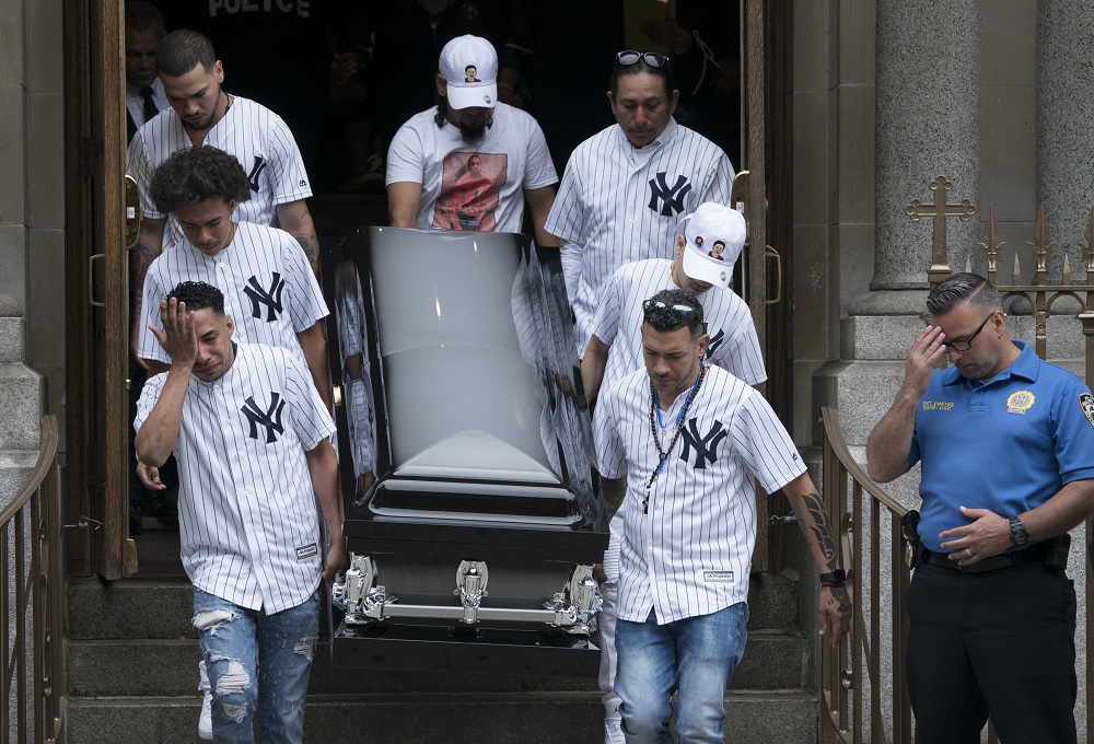 The body of of Lesandro Guzman-Feliz is taken from the Our Lady of Mount Carmel church after funeral services on June 27, 2018 in New York. u00e2u20acu201d AFP pic