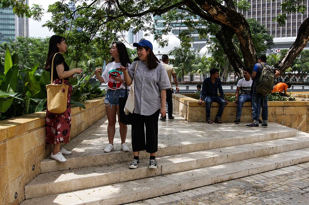 Tourists and immigrant workers spend their Hari Raya holiday in Kuala Lumpur on June 16, 2018. u00e2u20acu201d Picture by Miera Zulyana
