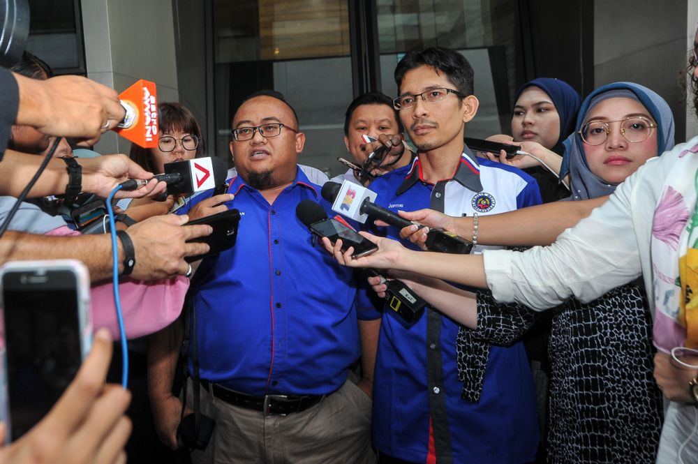 Mohammad Rizan Hassan (left) and Jufitri Joha speak to reporters after meeting the Council of Eminent Persons at Ilham Tower in Kuala Lumpur June 7, 2018. u00e2u20acu2022 Picture by Shafwan Zaidon