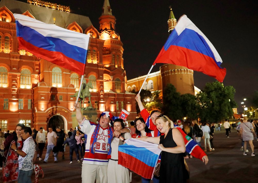 Russian fans hold national flags as they celebrate after the World Cup Group A - Russia vs Egypt match, in Moscow, Russia June 20, 2018. u00e2u20acu201d Reuters pic