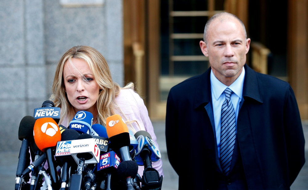  Adult film actress Stephanie Clifford, also known as Stormy Daniels, speaks to media along with lawyer Michael Avenatti outside federal court in the Manhattan borough of New York City, April 16, 2018. u00e2u20acu201d Reuters pic 