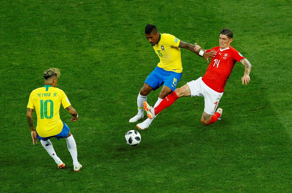 Switzerlandu00e2u20acu2122s Steven Zuber in action with Brazilu00e2u20acu2122s Paulinho and Neymar during their World Cup Group E match in Rostov Arena, Rostov-on-Don, Russia, June 17, 2018. u00e2u20acu201d Reuters pic