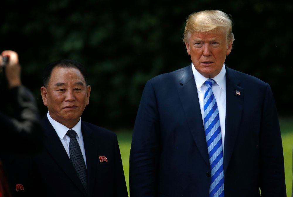 North Koreau00e2u20acu2122s envoy Kim Yong Chol poses with US President Donald Trump for a photo by an official photographer as he departs after a meeting at the White House in Washington, US, June 1, 2018. u00e2u20acu2022 Reuters pic