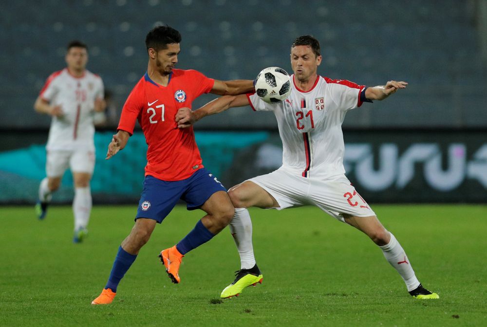 Chileu00e2u20acu2122s Jimmy Martinez in action with Serbiau00e2u20acu2122s Nemanja Matic during a World Cup warm-up match in Graz, Austria June 4, 2018. u00e2u20acu2022 Reuters pic