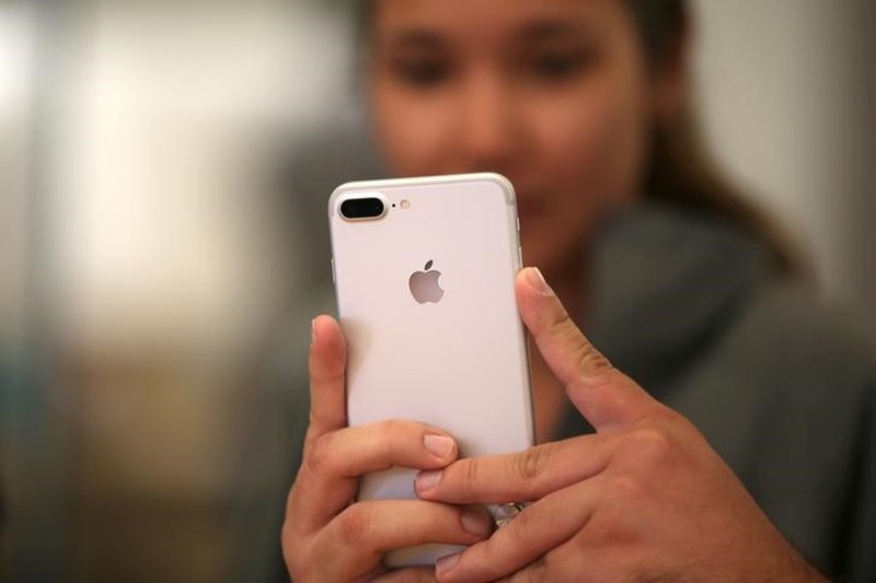 A customer views the new iPhone 7 smartphone inside an Apple Inc store in Los Angeles September 16, 2016. u00e2u20acu201d Reuters pic