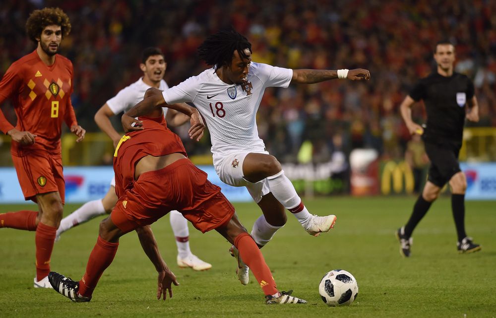 Portugalu00e2u20acu2122s Gelson Martins in action with Belgiumu00e2u20acu2122s Vincent Kompany during tjeir international friendly at King Baudouin Stadium, Brussels, Belgium, June 2, 2018. u00e2u20acu201d Reuters pic