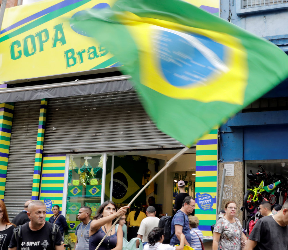 Customers walk around stores with Fifa World Cup memorabilia in downtown Sao Paulo June 13, 2018. u00e2u20acu201d Reuters pic
