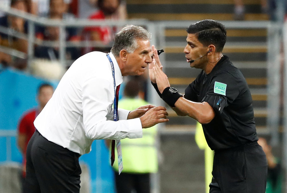 Iran coach Carlos Queiroz in a heated exchange with referee Enrique Caceres during the World Cup Group B match with Portugal in Saransk June 25, 2018. u00e2u20acu201d Reuters pic 