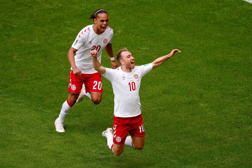 Denmark's Christian Eriksen celebrates with Yussuf Poulsen after scoring the first goal against Australia, June 21, 2018. u00e2u20acu2022 Reuters pic