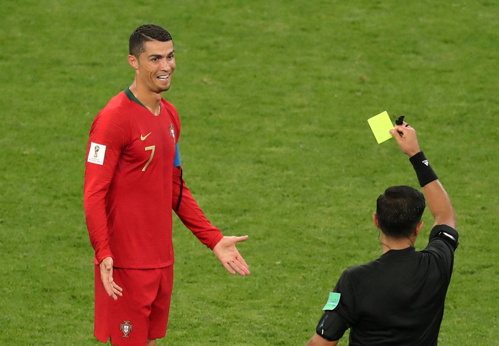 Portugal's Cristiano Ronaldo is shown a yellow card by referee Enrique Caceres in the World Cup Group B match against Iran in Saransk June 25, 2018 u00e2u20acu201d Reuters pic