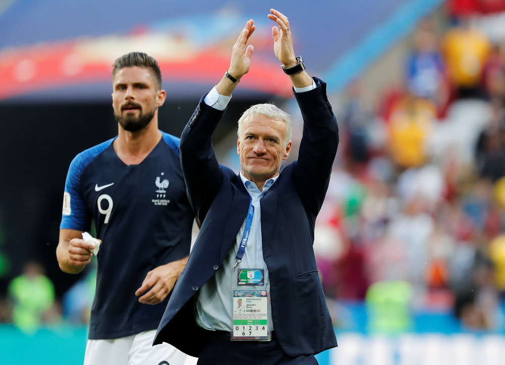 France coach Didier Deschamps (right) and Olivier Giroud celebrate after their World Cup Group C match with Australia in Kazan June 16, 2018. u00e2u20acu201d Reuters pic