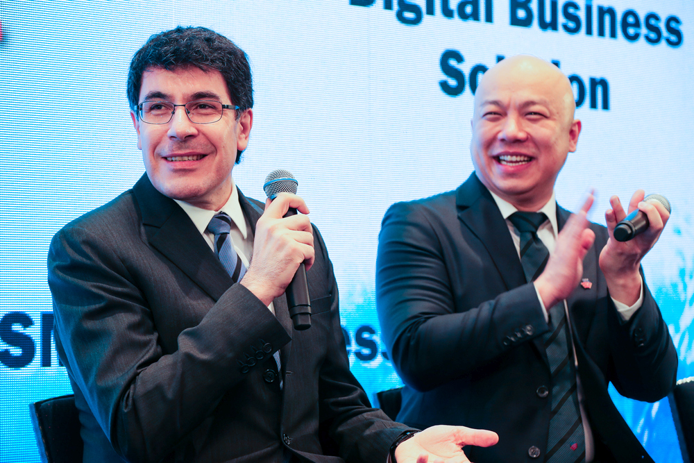 Hong Leong Bank Group Managing Director Domenic Fuda (left) and Head General Manager Group SME Banking Terrence Teoh speaks to at the aunching ceremony of SME Elite in Kuala Lumpur June 27, 2018. u00e2u20acu201d Picture by Ahmad Zamzahuri